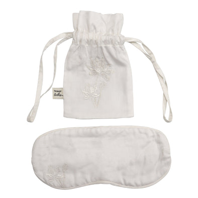 Ivory silk pouch embroidered with ivory pomegranate and eye mask