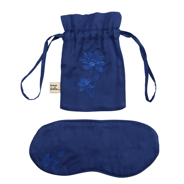Midnight blue silk pouch embroidered with blue lotus flower and eye mask also with lotus flower