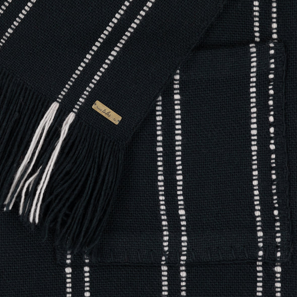 Blanket scarf wrap folded section black Mulesing-free Merino wool with cream stripe broken stripe long fringe monochrome hand woven from Thread Tales company