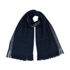 Neck loop showing this luxurious and practical indigo blanket scarf with pockets and generous proportions