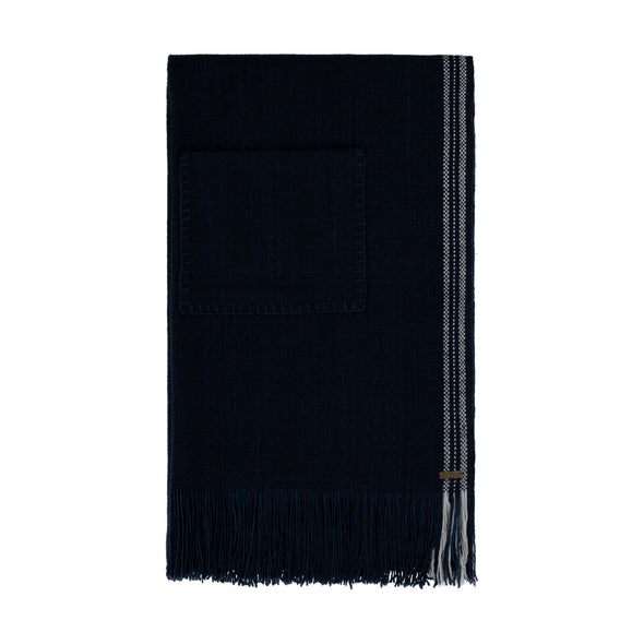 Indigo Merino wool blanket scarf with pocket showing folded view as styled as warm winter home accessory