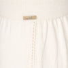 Cream harem joggers showing side pointelle stitching detail 