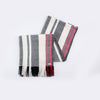 Scarf folded display red, black white twill stripes merino wool, handwoven heavyweight blanket from Thread Tales company