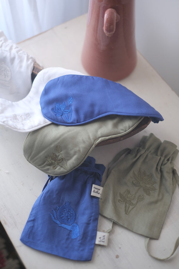 Collection of 3 eye masks in Midnight blue, ivory and olive, each with matching pouches for safe-keeping