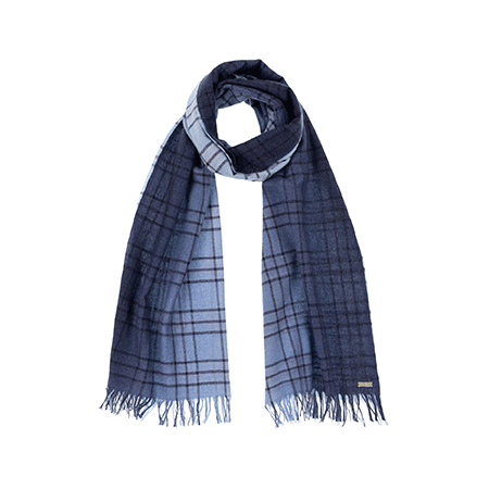 Neckloop of blue scarf woven with subtle open check in darker shade then dip dyed in shades of blue to subtle effect. Made from wool and cashmere lightweight warm luxurious scarf from Thread Tales company 