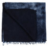 Folded detail of navy indigo hand tie dyed scarf made from 100% certified cashmere by Thread Tales company