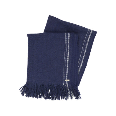 Model wearing navy indigo blanket shawl scarf large yak soft luxurious edge stripe cream from Thread Tales company